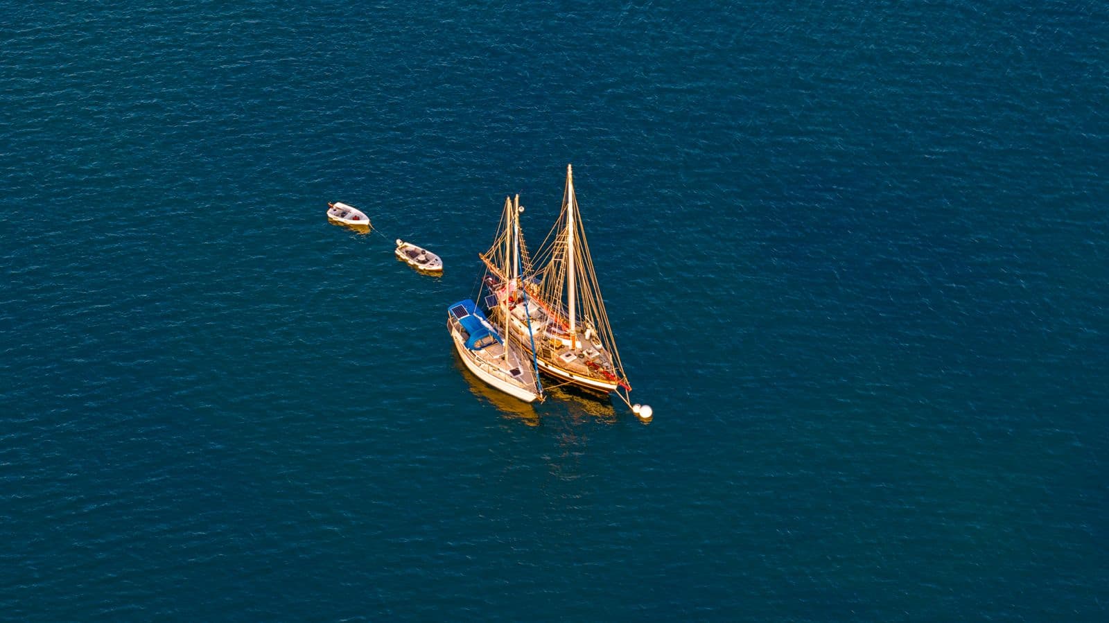 Boats anchored in Bermuda waters at golden hour