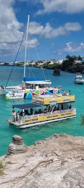 The Pontune Paradise anchored in a turquoise Bermuda cove